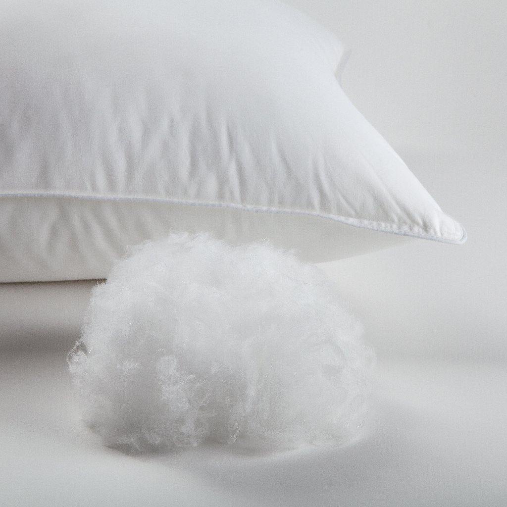 NF Zen Fibre Pillow with pile of Zen fibre infront